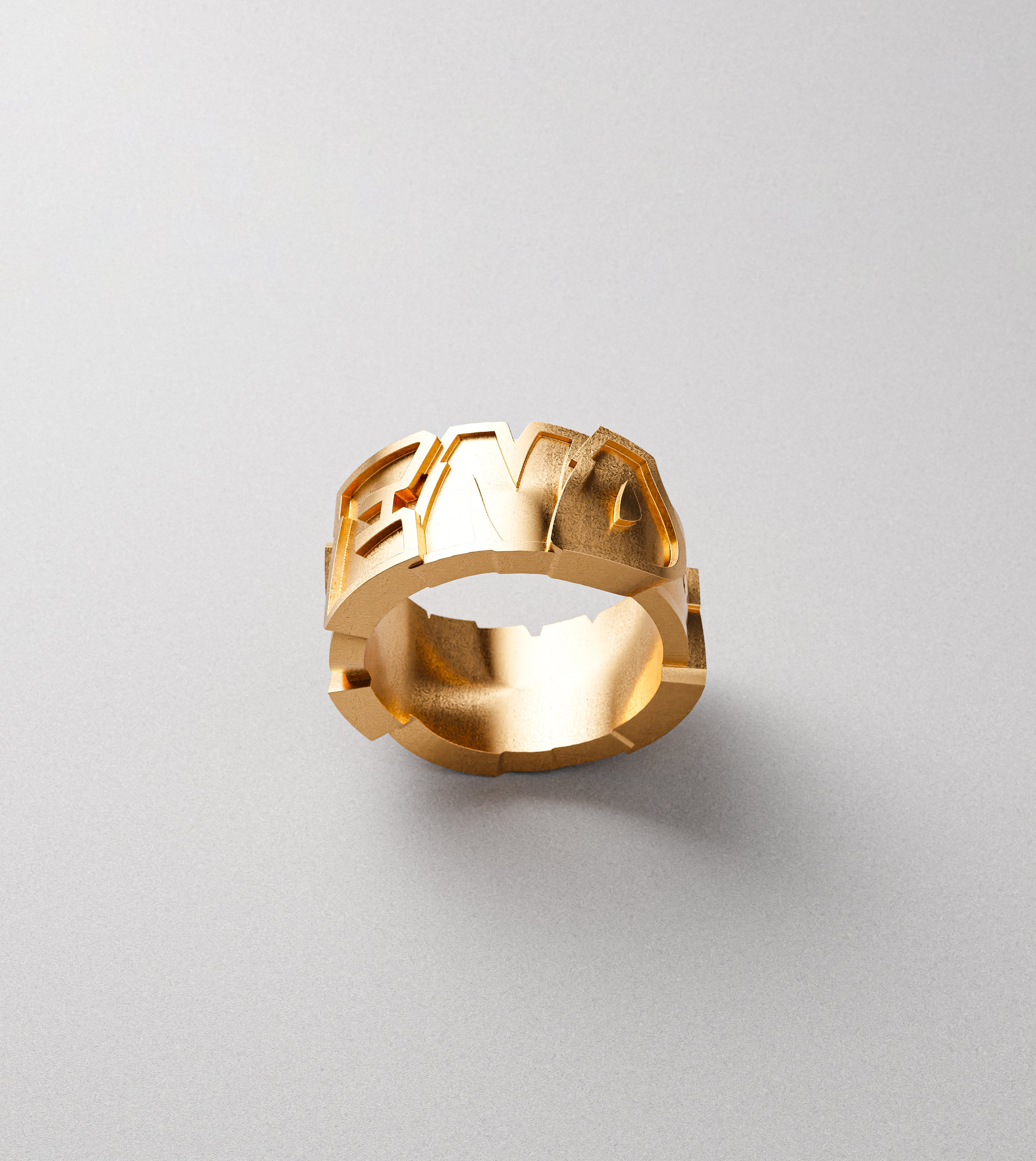 End to End block letters gold ring by Cast Pieces, top view
