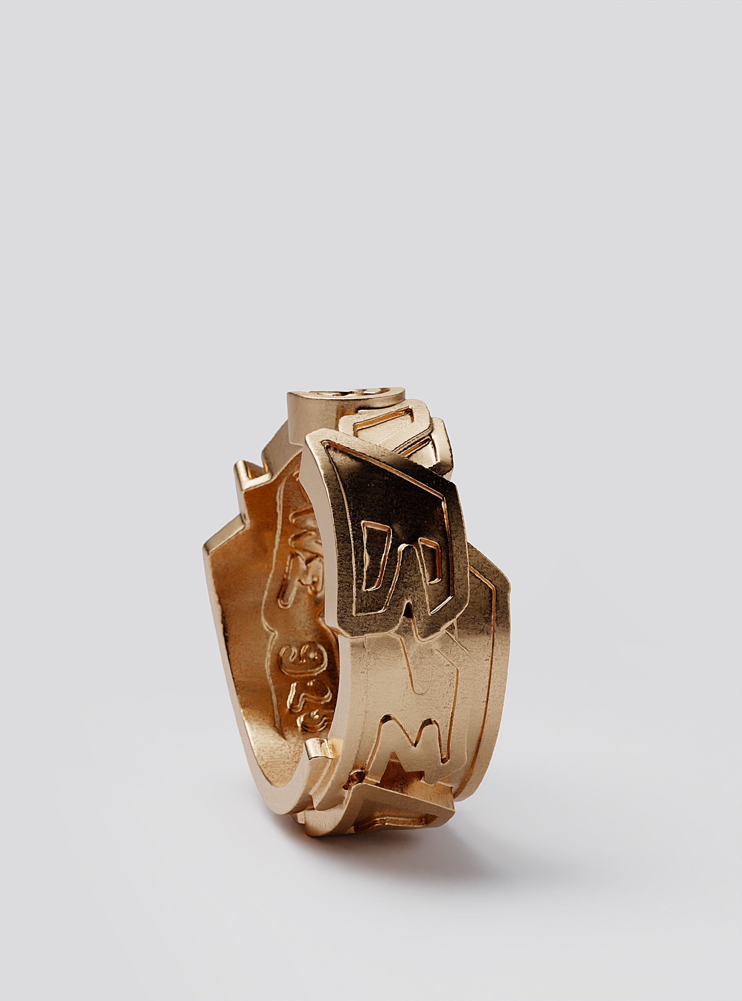 Side view of Cast Pieces gold Believe ring, wide and modern street style jewelry by Castpieces