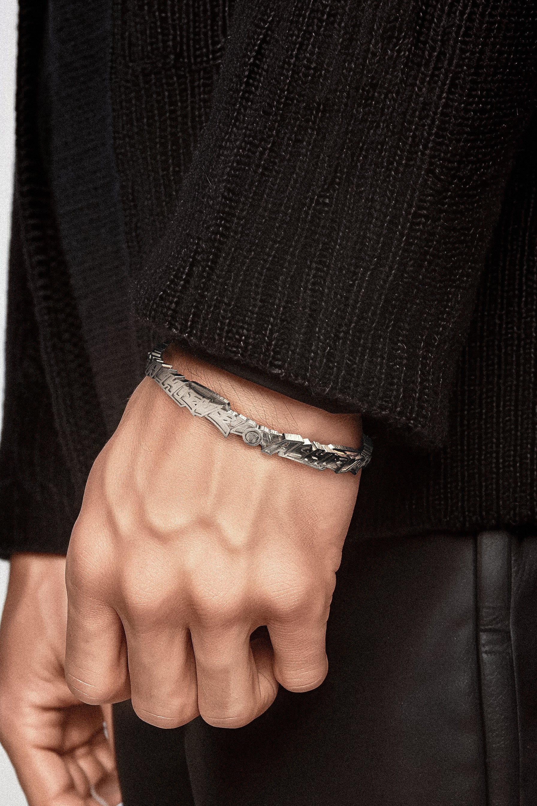 Model wearing Cast Pieces silver Achieve narrow cuff bracelet, fashionable jewelry by Castpieces