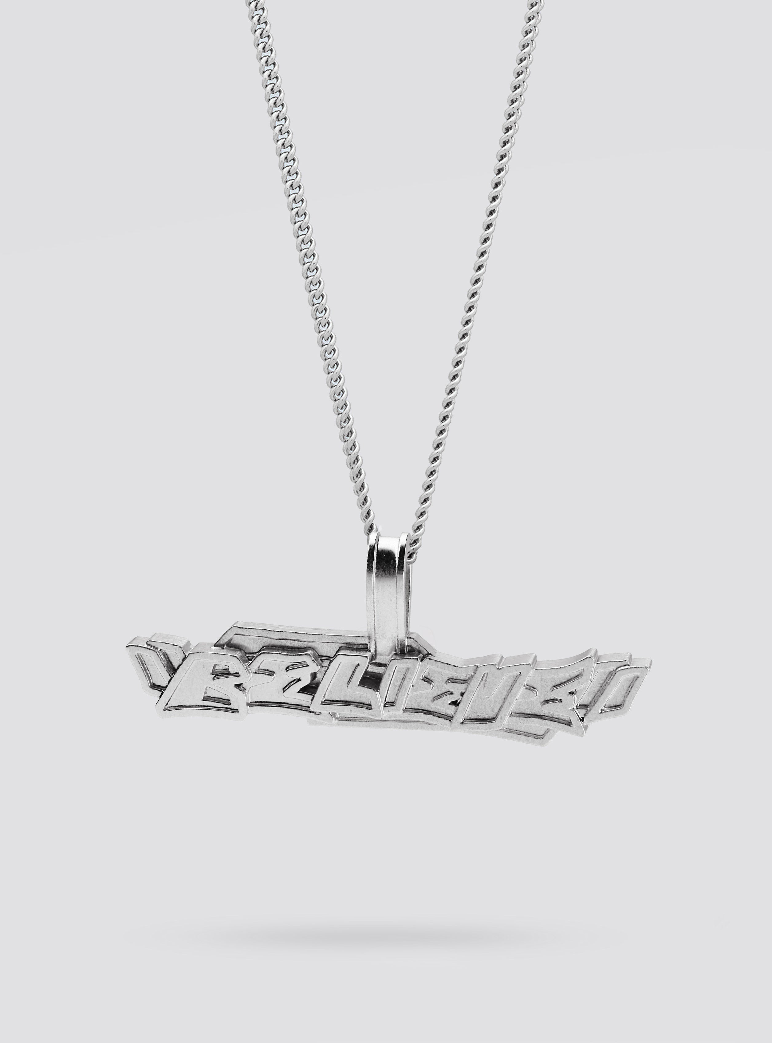 Side view of Cast Pieces silver Believe pendant, modern street style jewelry by Castpieces